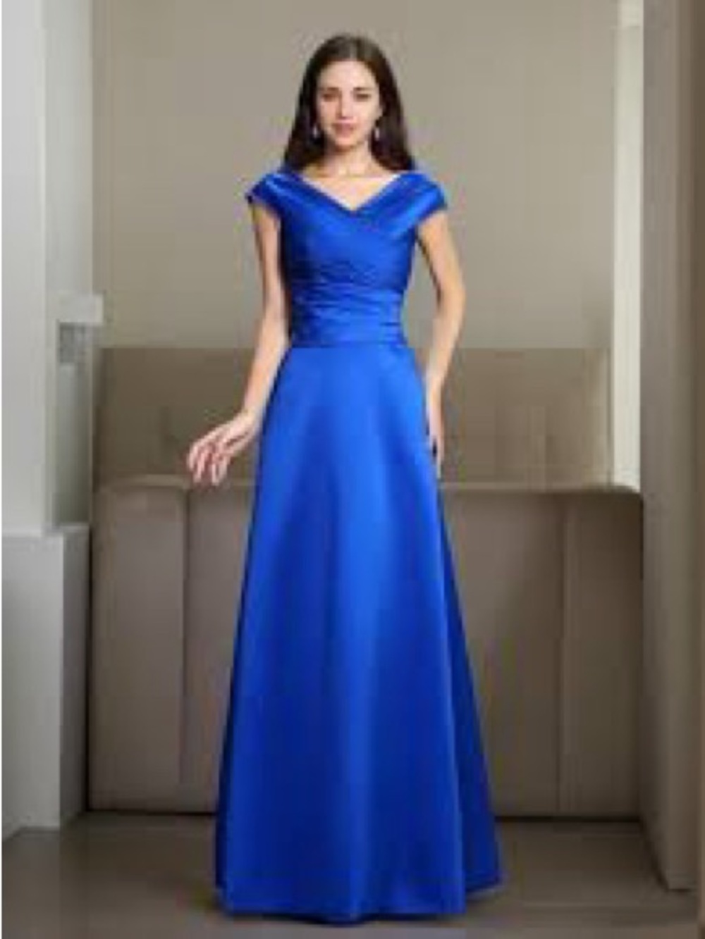 DaVinci Bridesmaids formal gown styled in royal blue satin.